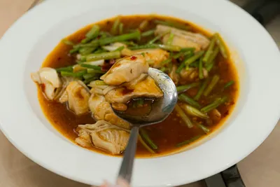 Fish stew with green vegetables in a savoury broth