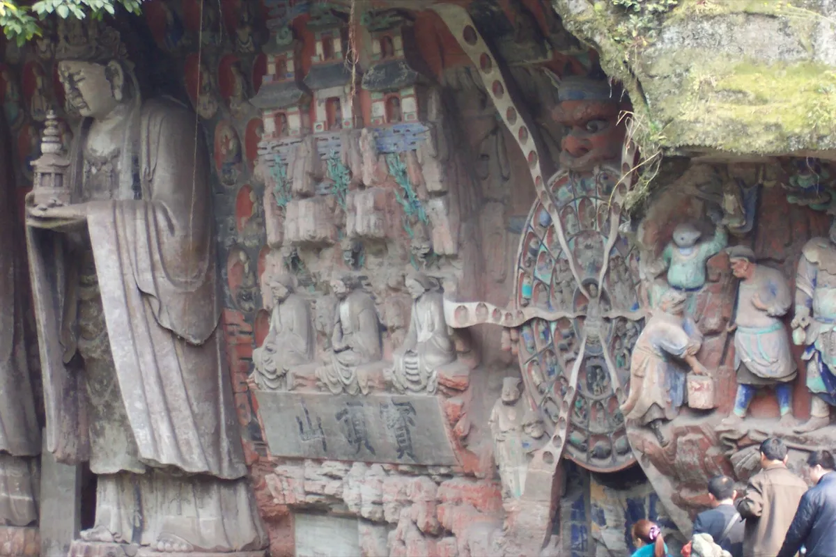 Buddhist rock carvings and statues cut into the cliff face at Dazu