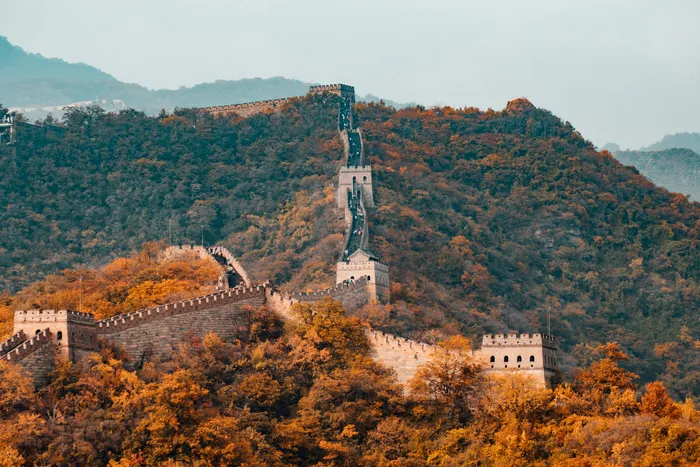 The Great Wall at Mutianyu snaking over autumn mountains