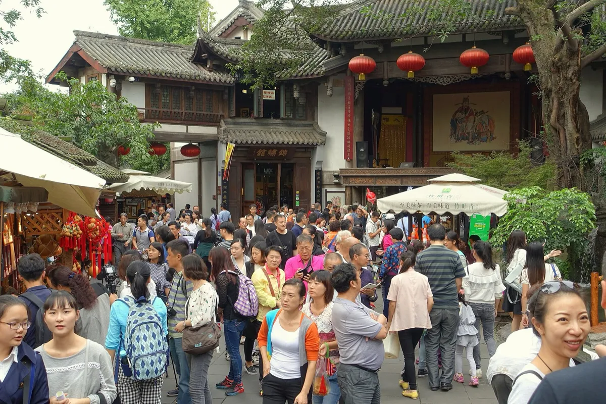 Crowds browsing lantern-lit shops along Jinli Street in Chengdu
