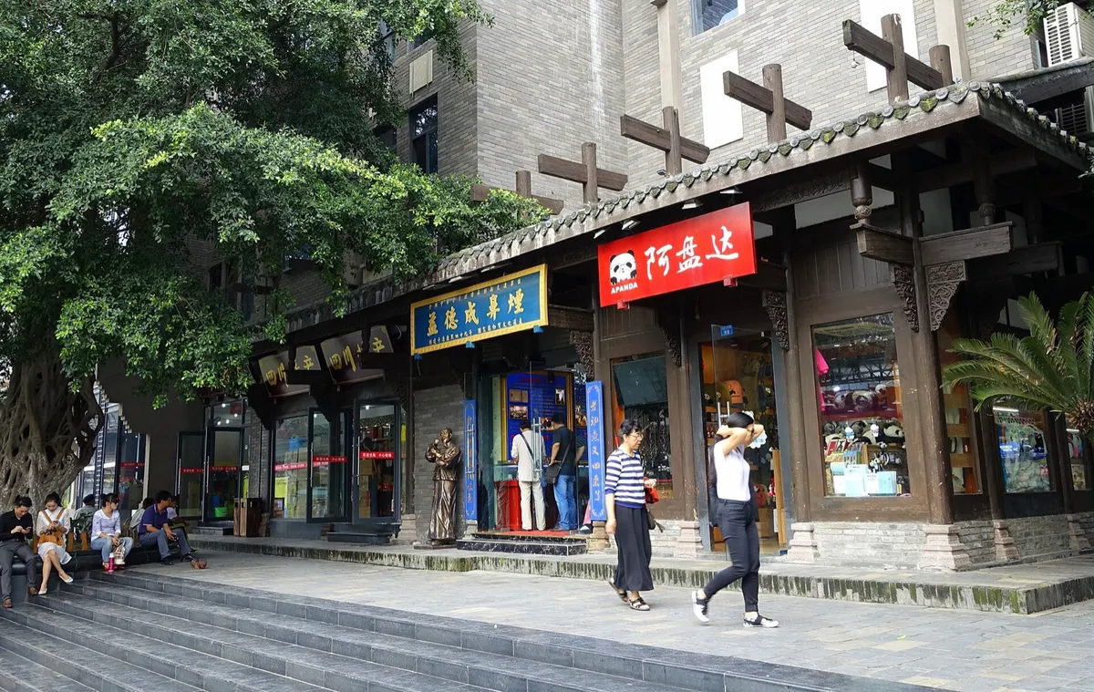 A traditional shopfront with a panda-branded sign along Kuanzhai Alley in Chengdu