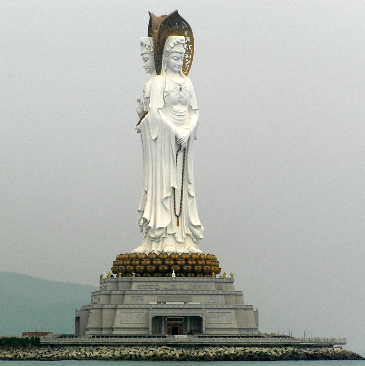 The 108-meter three-faced Guanyin statue standing over the sea at Nanshan near Sanya